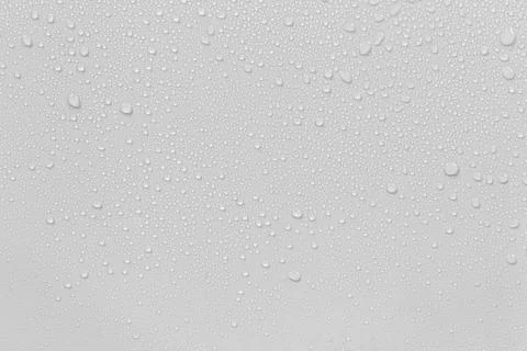 The concept of raindrops falling on a gray background Abstract wet white su.. Stock Photos