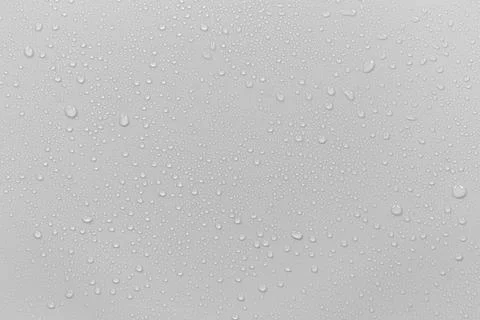 The concept of raindrops falling on a gray background Abstract wet white su.. Stock Photos