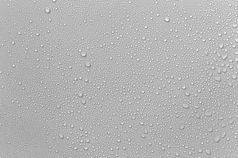 The concept of raindrops falling on a gray background Abstract wet white su.. Stock Photos