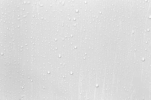 The concept of raindrops falling on a gray background Abstract wet white su.. Stock Photos