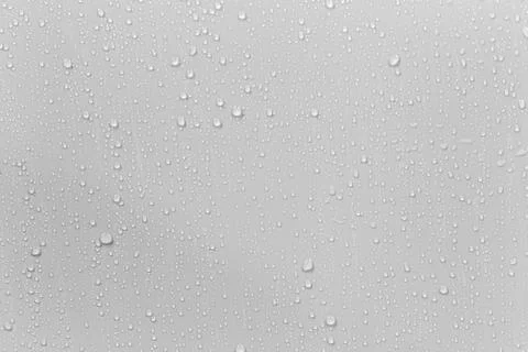 The concept of raindrops falling on a gray background Abstract wet white su.. Stock Photos