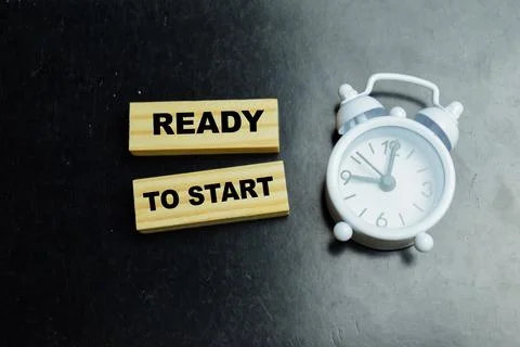 Concept of ready to start text on wooden blocks. Stock Photos