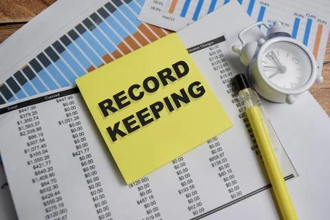 Concept of record keeping write on sticky notes isolated on Wooden Table. Stock Photos