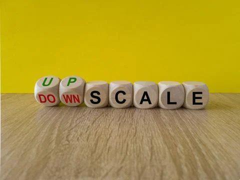 Concept red words Upscale or Downscale on wooden cubes Stock Photos