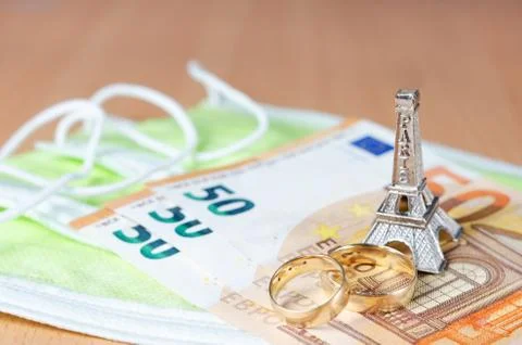 Concept regarding postponement and reprogramming  honeymoon  in France during Stock Photos