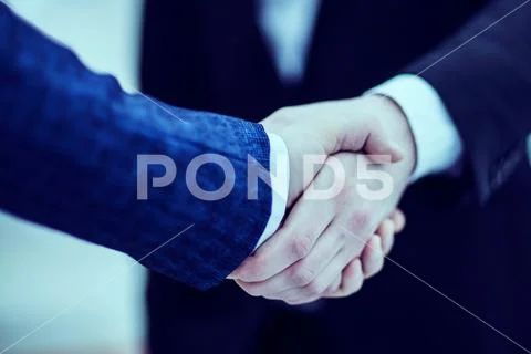 Concept of a reliable partnership : a handshake of business partners Stock Photos