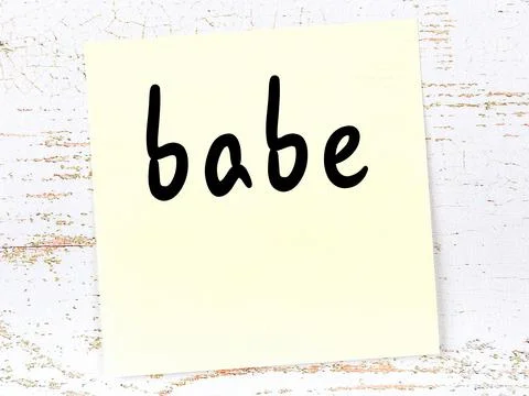 Concept of reminder about babe. Yellow sticky sheet of paper on wooden wall w Stock Illustration