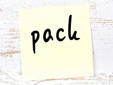 Concept of reminder about pack. Yellow sticky sheet of paper on wooden wall w Stock Illustration