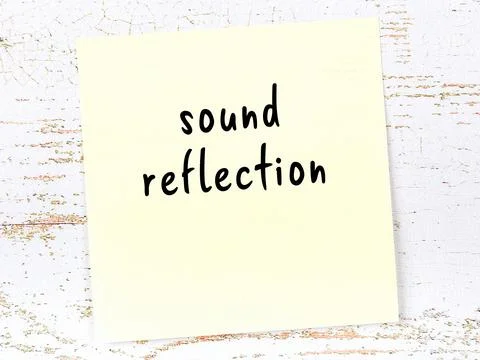Concept of reminder about sound reflection. Yellow sticky sheet of paper on w 写真素材