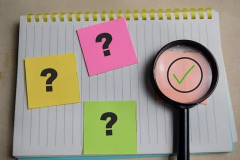 Concept of right or true and question mark symbolizing investigation Stock Photos
