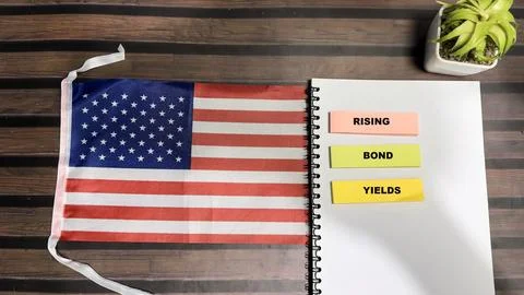 Concept of Rising Bond Yields write on sticky notes Stock Photos