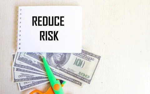 The concept of risk management. There is a notebook with the inscription "Red Stock Photos