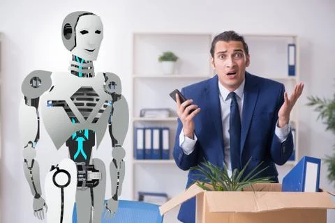 Concept of robots replacing humans in offices Stock Photos