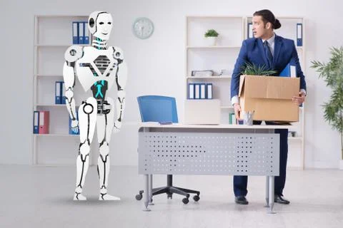 Concept of robots replacing humans in offices Stock Photos