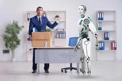 Concept of robots replacing humans in offices Stock Photos