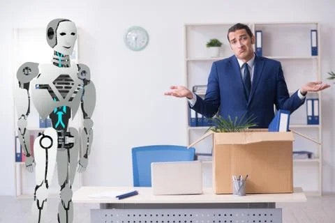 Concept of robots replacing humans in offices Stock Photos