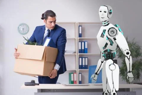 Concept of robots replacing humans in offices Stock Photos