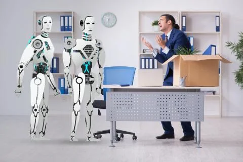 Concept of robots replacing humans in offices Stock Photos