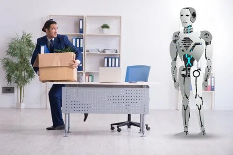 Concept of robots replacing humans in offices Stock Photos