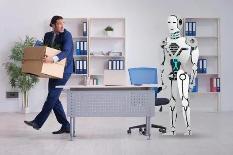 Concept of robots replacing humans in offices Stock Photos