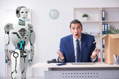 Concept of robots replacing humans in offices Stock Photos