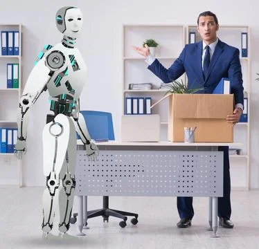 Concept of robots replacing humans in offices Stock Photos