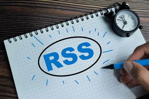 Concept of RSS - Reality Simple Syndication write on book Stock Photos
