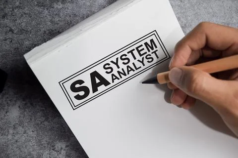 Concept of SA - System Analyst write on book isolated on Wooden Table. Stock Photos