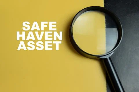 Concept of safe haven asset write on color background with magnifying glass. Stock Photos