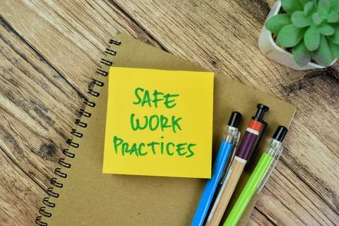 Concept of Safe Work Practices write on sticky notes isolated on Wooden Table 스톡 사진