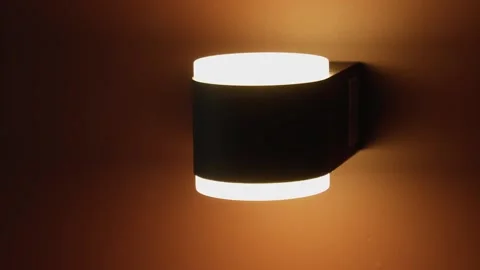 The concept of saving electricity. The lamp turns off in the bedroom before Vidéo 252748359