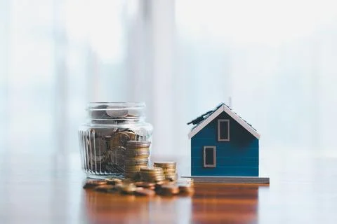 Concept of saving money involves finance, calculating tax, loan and bank se.. Stock Photos