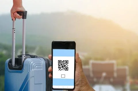 Concept of scanning a mobile QR CODE on a mobile phone. Stock Photos
