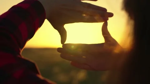 Concept of seeing world as different. Seems like in movies. Hands of a young Video stock 197342562