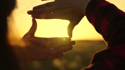 Concept of seeing world as different, Sees like in movies. Hands of young female Stock Footage 211186788