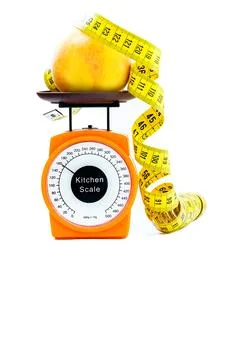 Concept of slimming regime. scale, measuring tape, peach. Stock Photos