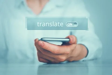 Concept of a smartphone program for translating texts Stock Photos