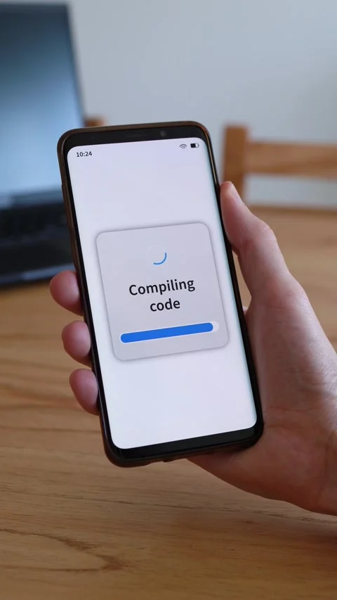 Concept of software development on smartphone. Compiling code screen. Vertical Stock Footage 321386236
