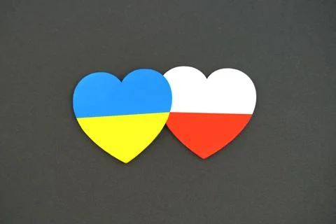 Concept of solidarity and help. Flags of Ukraine and Poland. Two hearts isola Stock Illustration