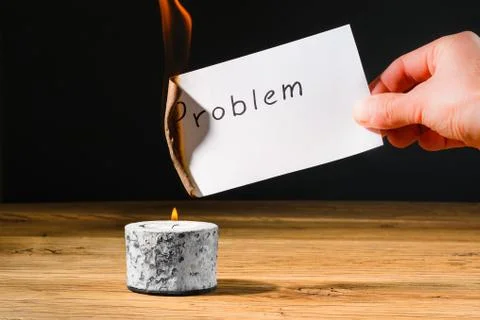 Concept for solution to problem by burning paper with text problem Stock Photos