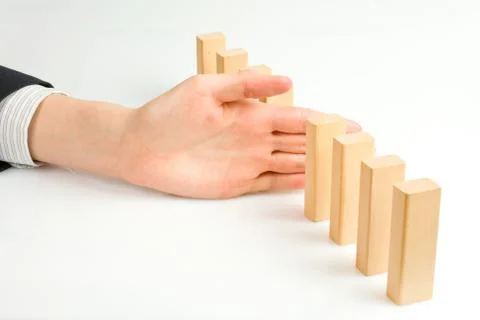 Concept for solution to a problem by stopping the domino effect Foto stock