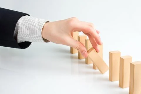 Concept for solution to a problem by stopping the domino effect 스톡 사진