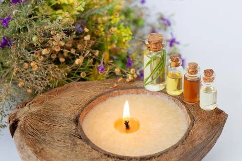 Concept of SPA procedure with herbal essential oils, burning candle and healt Stock Photos