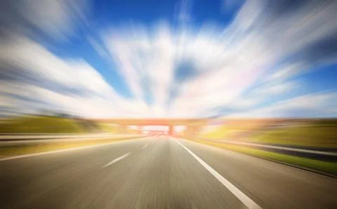 The concept of speed and focus. Motion effect. Empty highway Stock Photos