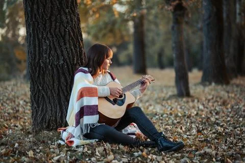 Concept of spending time with an instrument and own thoughts Stock Photos