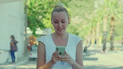 The concept of spending time with a mobile phone. Stock Footage 166000938