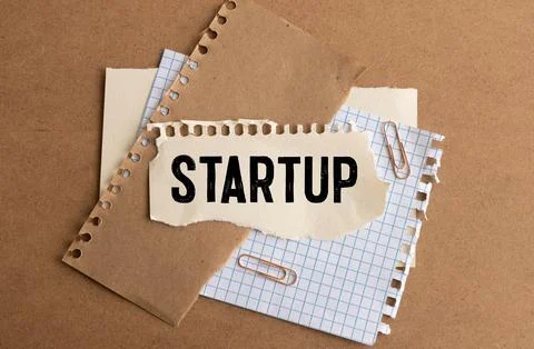 Concept Start Up. A lot of red rocket on a gray background. Stock Photos