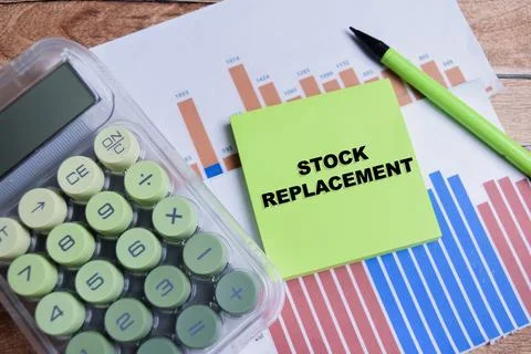 Concept of stock replacement write on sticky notes isolated on Wooden Table. Stock Photos