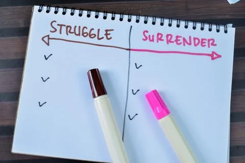 Concept of Struggle and Surrender write on book. Supported by an additional. Foto stock
