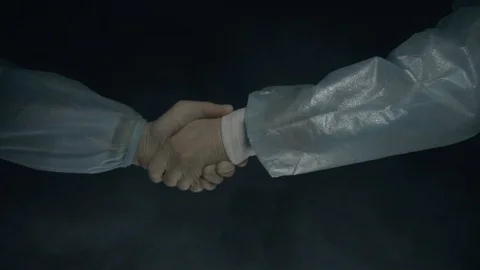 Concept of successful outcome of the operation. Doctors surgeons shake hands Stock Footage 120003703